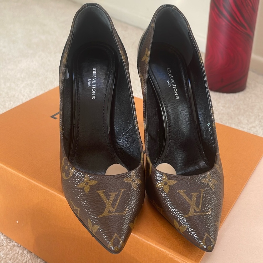 Beautiful Louis Vuitton brown high heel pumps barely worn few times almost new .